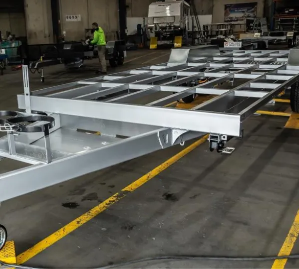 Galvanised steel trailer chassis frame under construction in a fabrication workshop
